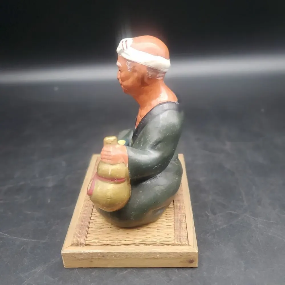 Vintage Asian Seated Man Figurine Holding Gourd Cup Woven Wood Base